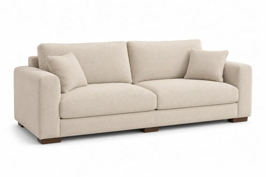 Divano in tessuto beige con cuscini